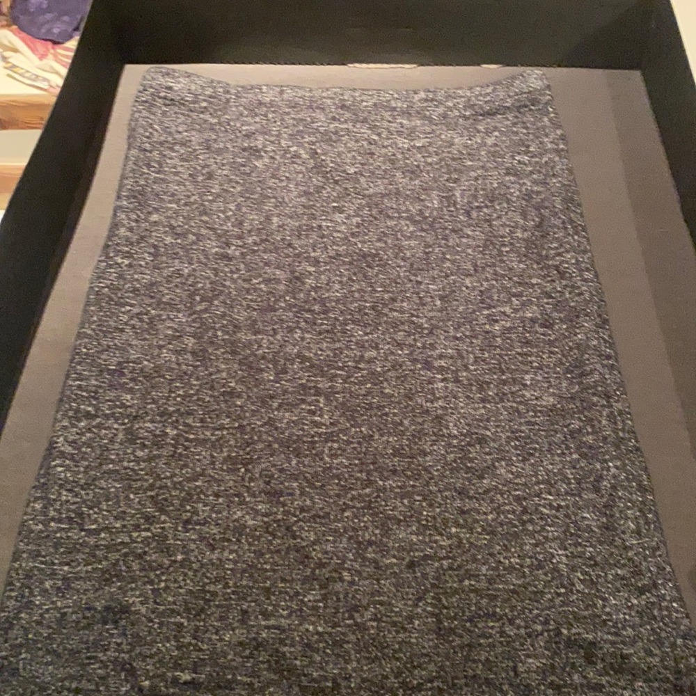 Express form fitting soft skirt to the knees